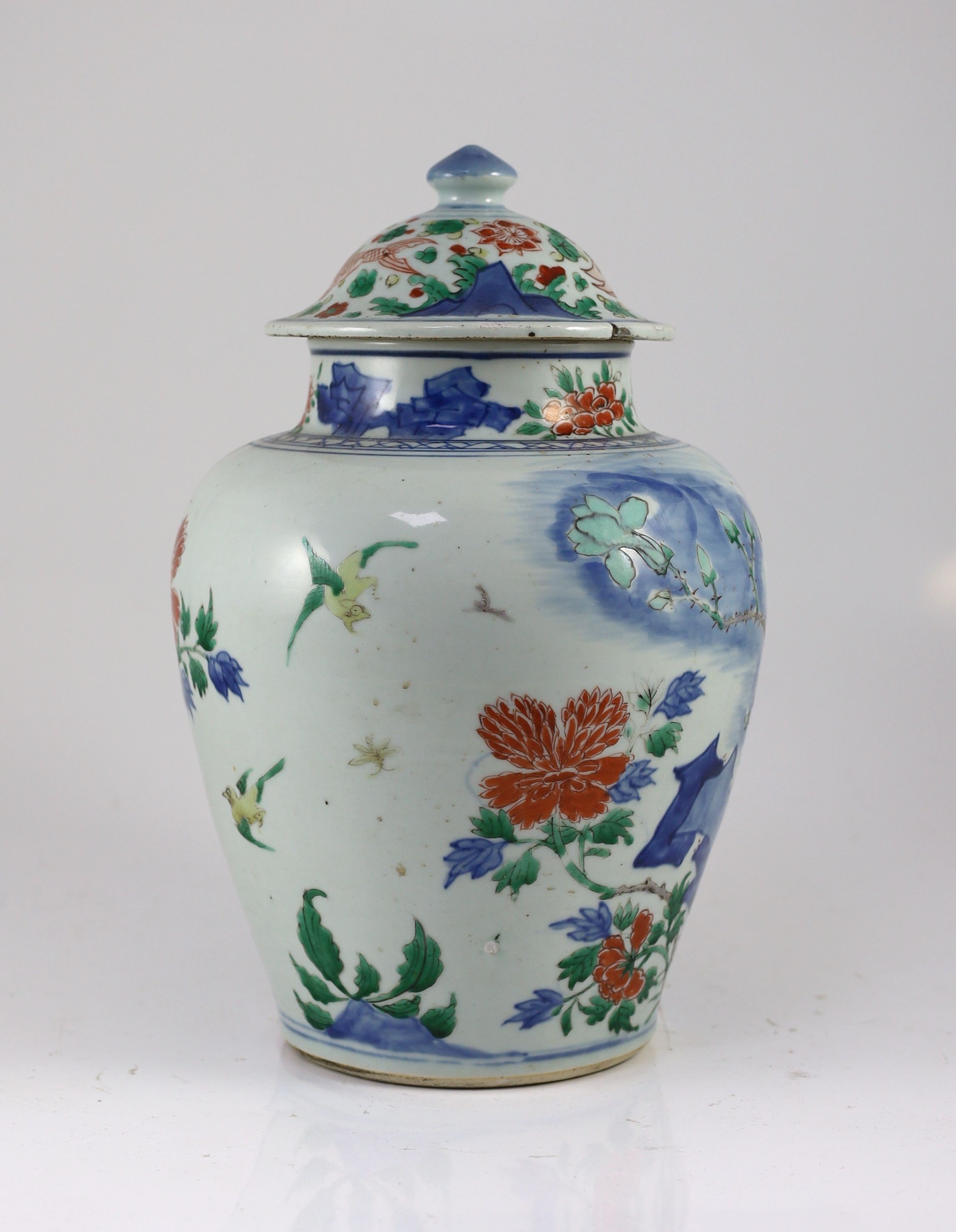 A Chinese transitional wucai jar and cover, c.1650, 36cm high, some damage